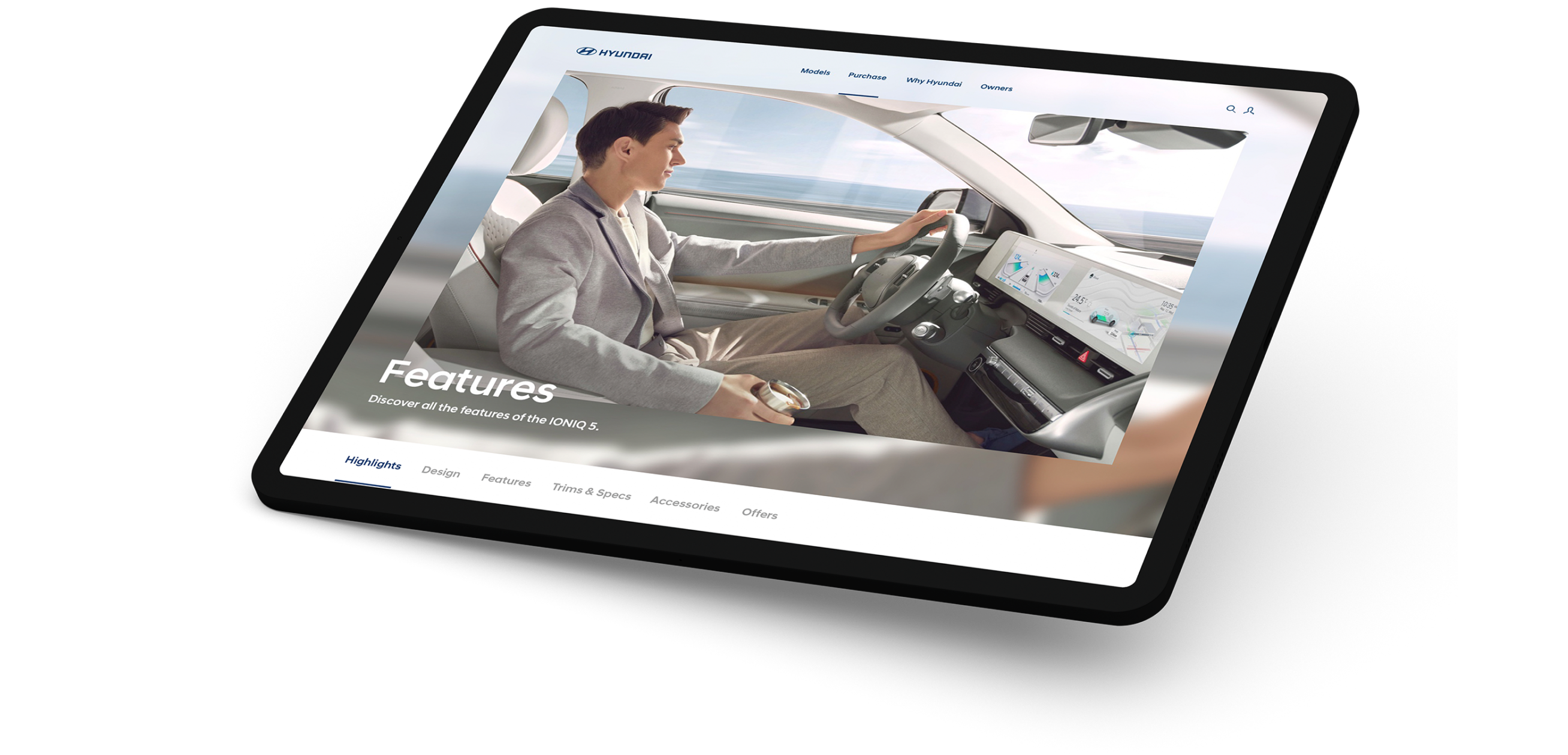 Screen with a man at the wheel of a Hyundai car