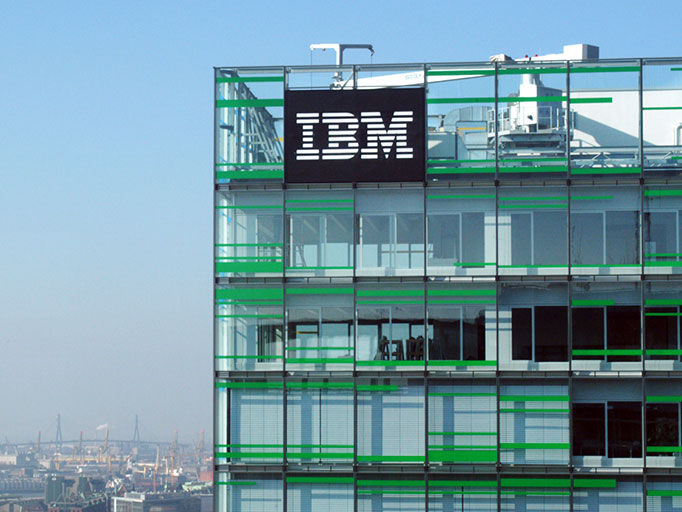 The photo shows the IBM logo on a building
