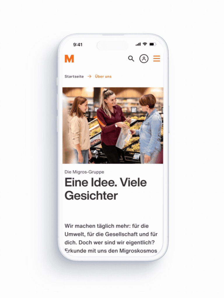Mockup eines iPhone-Geräts, das die Migros-Website anzeigt, während durch den Inhalt gescrollt wird.